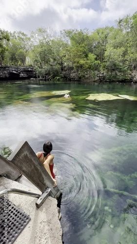 Swimming in Heart Cenote, Yucatán, Mexico , Underwater Adventure and Bathing. Exploring Heart Cenote in Yucatán, Mexico ,  Swim, Dive, and Relax in Crystal Waters