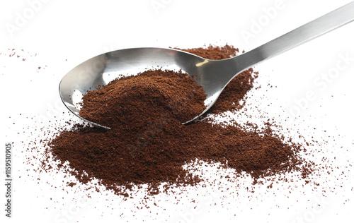 Pile of powder instant coffee in metal spoon isolated on white background, clipping path