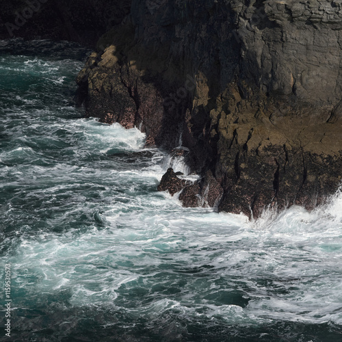 Detail of the waves of the Atlantic Ocean crushing into the Kilkee Cliffs, Irland