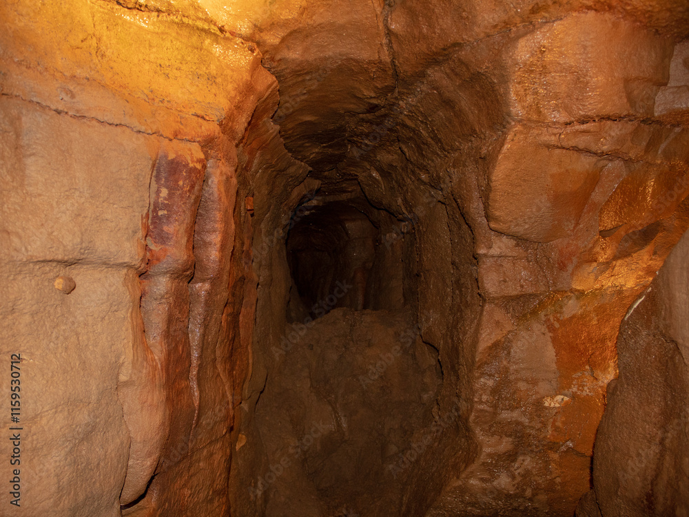 A natural rock tunnel inside the Ohio Caverns. A natural rock tunnel inside the Ohio Caverns.