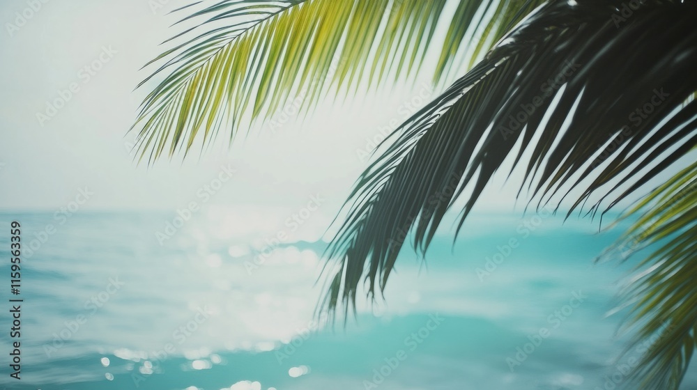 Fototapeta premium Palm tree branch swaying over a turquoise ocean, tropical beach setting generative ai