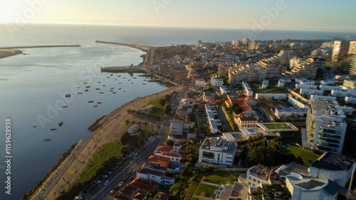 Vista capturando a deslumbrante paisagem do Porto e de Matosinhos, onde o Rio Douro encontra o Oceano Atlântico. A cena apresenta as areias douradas da praia de Matosinhos,  photo