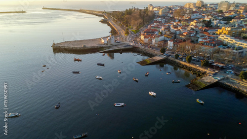 Vista capturando a deslumbrante paisagem do Porto e de Matosinhos, onde o Rio Douro encontra o Oceano Atlântico. A cena apresenta as areias douradas da praia de Matosinhos,  photo