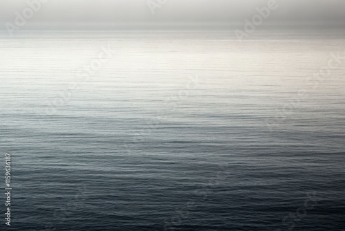 Monochrome serenity over calm waters coastal landscape nature photography minimalistic environment tranquil viewpoint