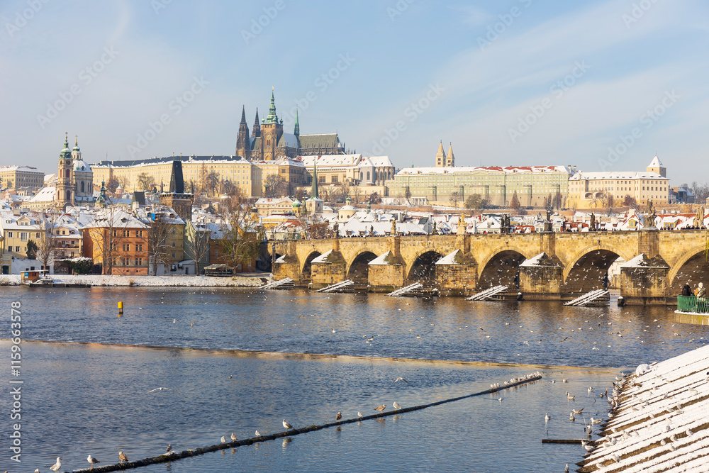 Snowy Prague Lesser Town with Prague Castle above River Vltava, Czech republic