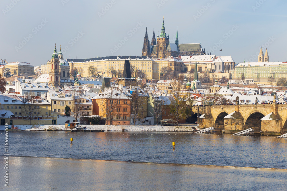 Snowy Prague Lesser Town with Prague Castle above River Vltava, Czech republic