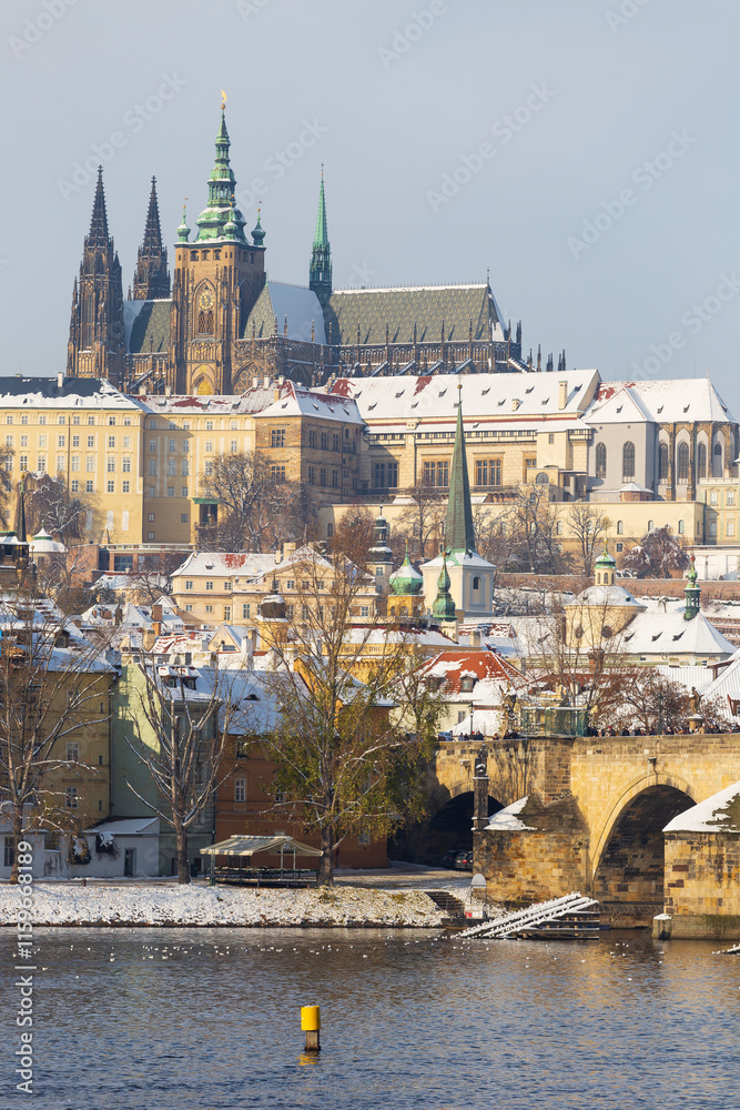 Snowy Prague Lesser Town with Prague Castle above River Vltava, Czech republic