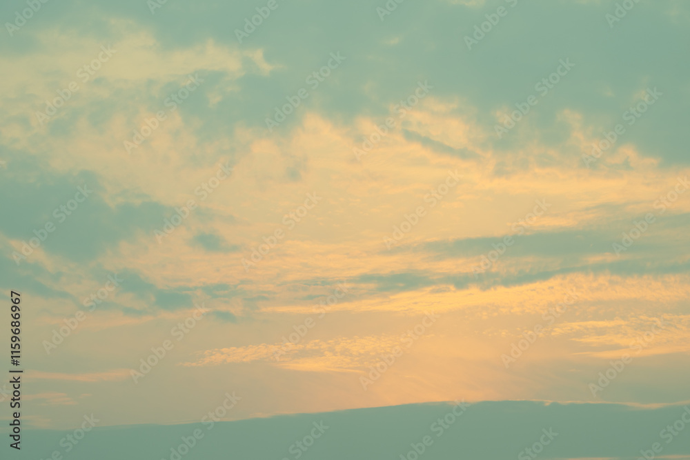 Fototapeta premium Late evening sky light through light cloud creating ethereal effect in retro tones