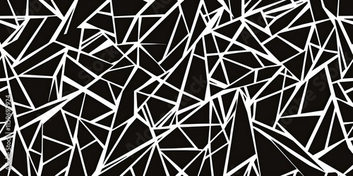Abstract black and white geometric pattern with sharp angular shapes creating a shattered glass effect.