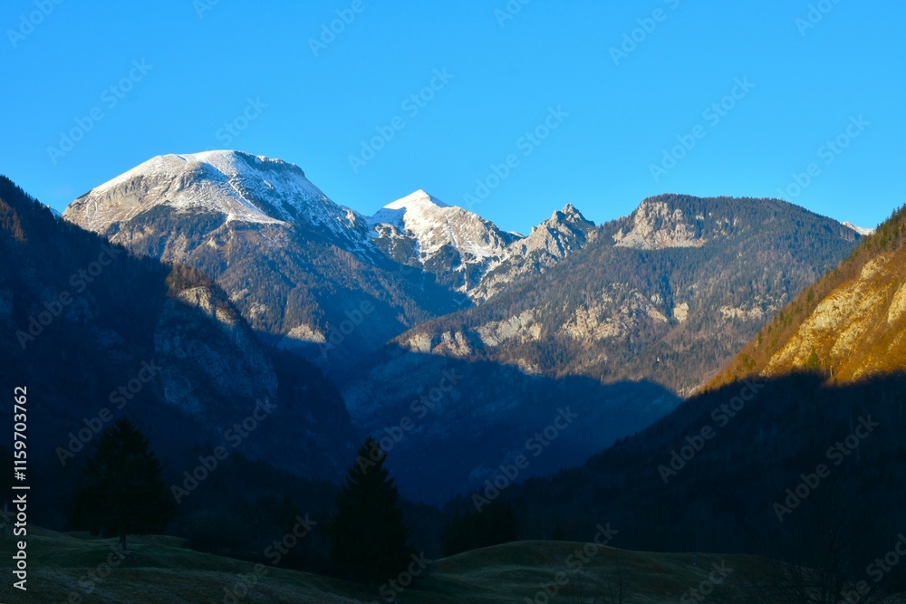 Obraz premium View of Tošc and Draški Vrh mountain peaks above Voje valley in Gorenjska, Slovenia