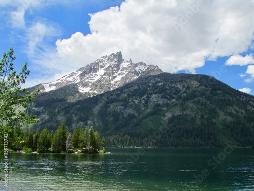 Grand Teton National Park in Wyoming, USA mountain view with a lake in the foreground. photo