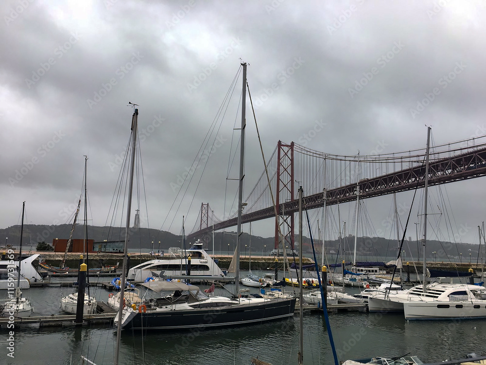 Marina with Sailboats and 25 de Abril Bridge in Lisbon, Portugal Marina with Sailboats and 25 de Abril Bridge in Lisbon, Portugal