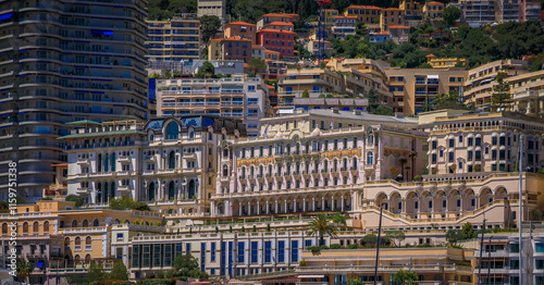 A close-up view of the vibrant cityscape of Monaco, showcasing colorful buildings and intricate architectural details on a hillside in Monte Carlo photo