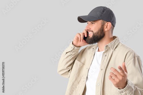 Young bearded man talking b...