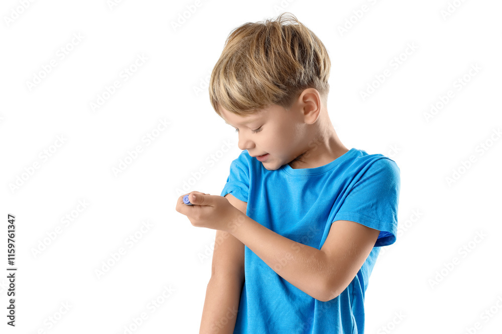 Little diabetic boy using lancet pen on white background Little diabetic boy using lancet pen on white background
