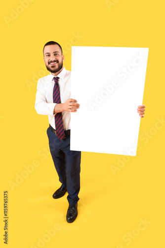 Young businessman with blan...