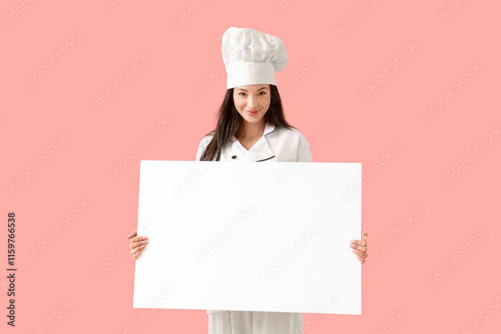 Beautiful chef with blank poster on pink background Beautiful chef with blank poster on pink background