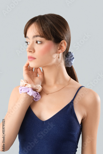 Young woman with ponytail a...