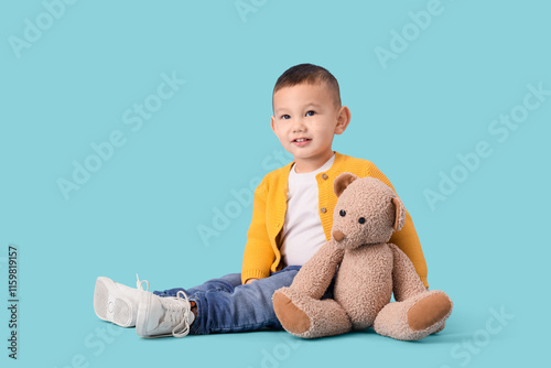 Cute little Asian boy with ...