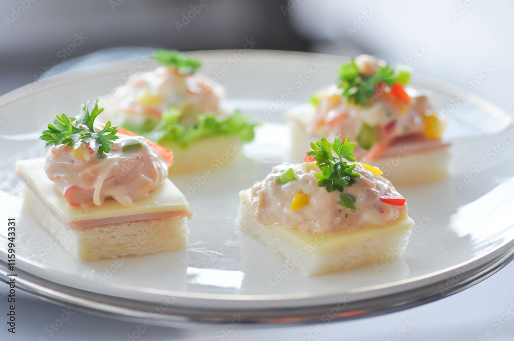 canape or toast with ham , cheese , crab stick and tuna canape or toast with ham , cheese , crab stick and tuna