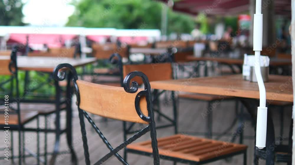 Charming Outdoor Caf with Rustic Wooden Tables and Chairs Charming Outdoor Caf with Rustic Wooden Tables and Chairs