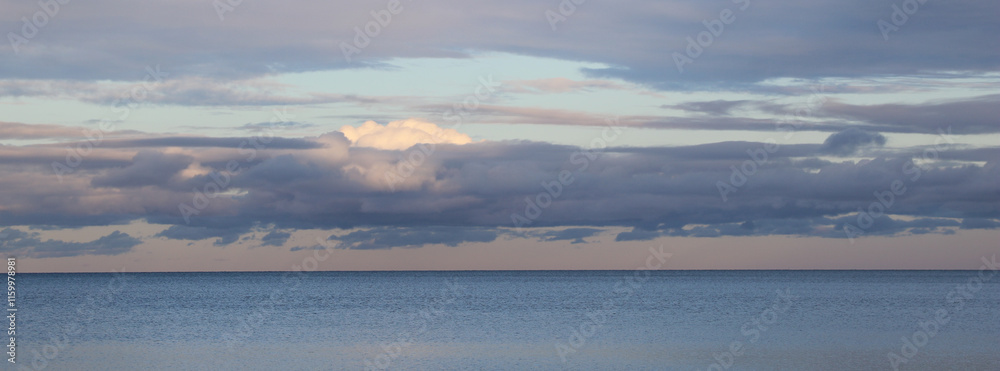 Fototapeta premium Evening clouds over Lake Vanern, Sweden.