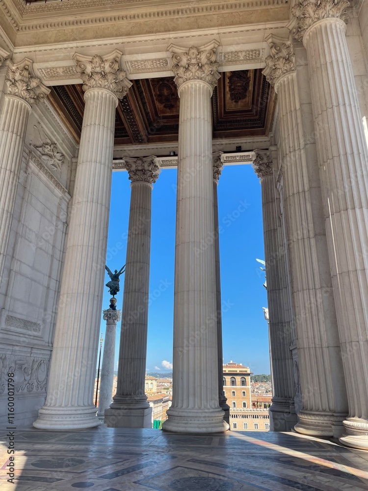 Sun Peaking through Columns in the Monument to Victor Emanuel II Sun Peaking through Columns in the Monument to Victor Emanuel II