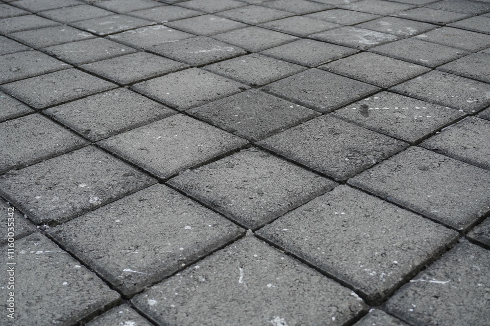 The background of the gray street paving is in the form of neatly arranged boxes The background of the gray street paving is in the form of neatly arranged boxes