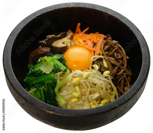 Korean Dolsot Bibimbap in Hot Stone Bowl with Vegetables and Egg photo