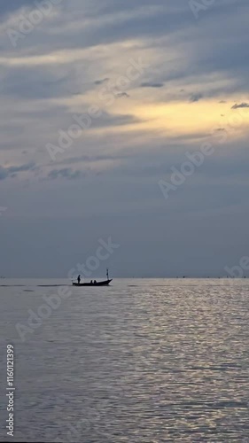Wallpaper Mural fishing boat goes on the sea during sunset in the evening Torontodigital.ca