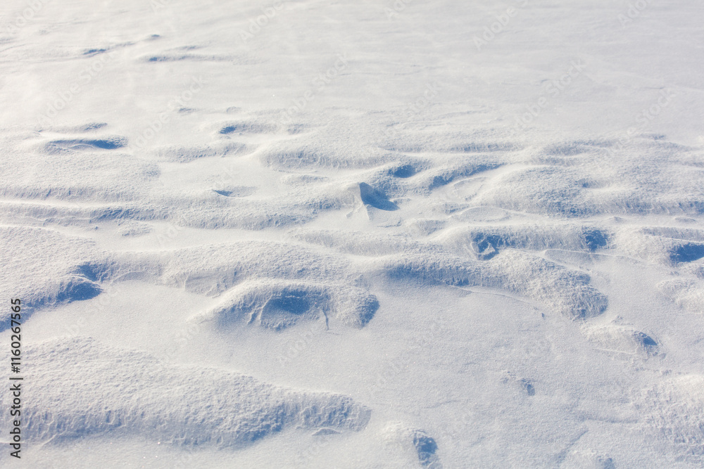 The snow is white and the ground is covered in it The snow is white and the ground is covered in it