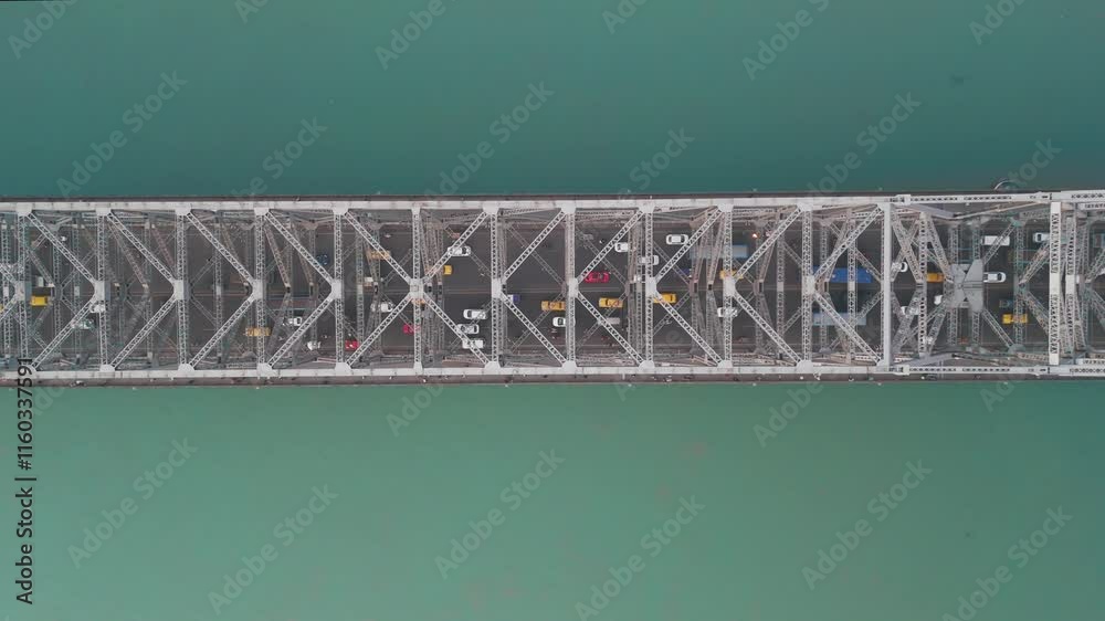Aerial view of Kolkata Iconic Howrah Bridge or Rabindra setu over Ganga River top view