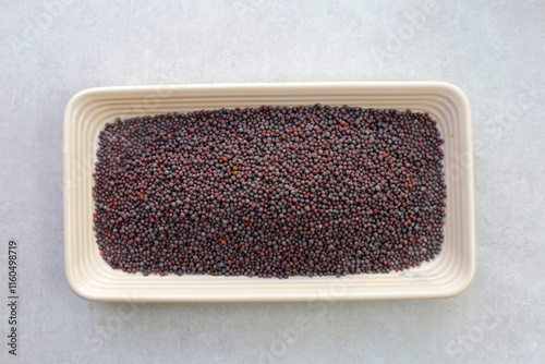 Raw organic black mustards seeds photo