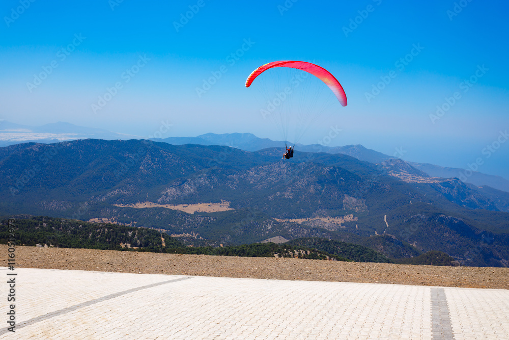 Flying paraglider at Babadag mountain in Turkey