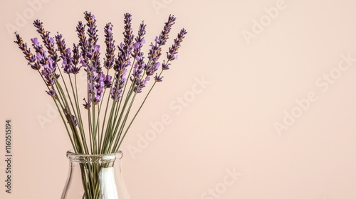 A vase filled with purple lavender flowers against a soft backdrop. photo