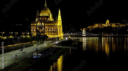 Looking down the Danube River from Margret Bridge. View of the Parliament Building, Chain Bridge and the Buda Castle. Light Traffic and no people. Wide Angle Shot photo