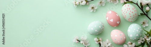 Easter banner template with Easter eggs and flower on light green background.Greetings and presents for Easter Day in flat lay styling. photo