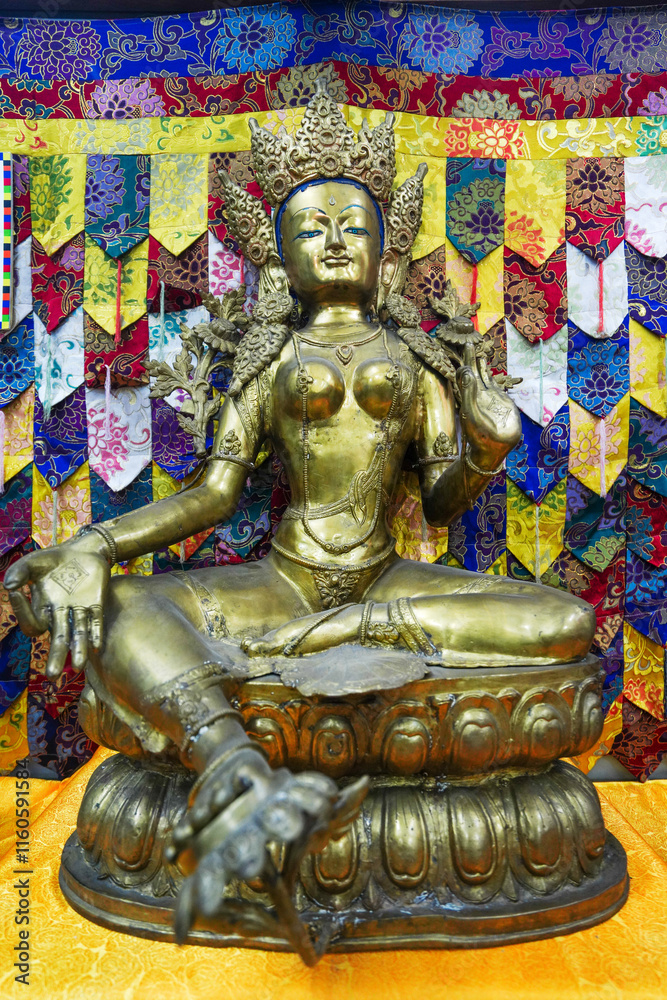 Buddha Statues on display in Kangba Folk Houses in the Tibetan Scenic Area of China Ethnic Museum