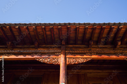 Obraz na płótnie Woodcarving of Tu Nationality Manor in China Ethnic Museum w salonie