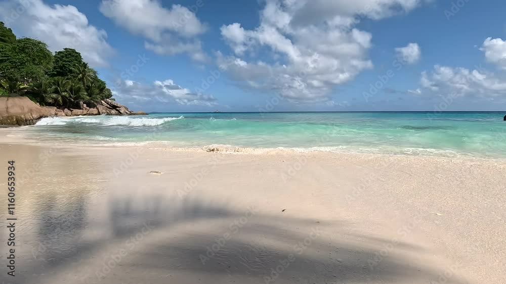 Stunning views of empty beaches of the wonderful islands of Seychelles. Beautiful landmark. Clear, sunny day, warm sunlight. No people, outdoors. Concept of leisure and travel Stunning views of empty beaches of the wonderful islands of Seychelles. Beautiful landmark. Clear, sunny day, warm sunlight. No people, outdoors. Concept of leisure and travel