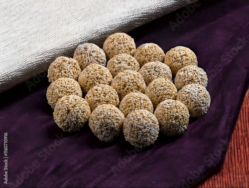 Tilkut til ke laddu or til gud laddu,Sesame seeds Laddu, sweets of makar Sankranti festival photo
