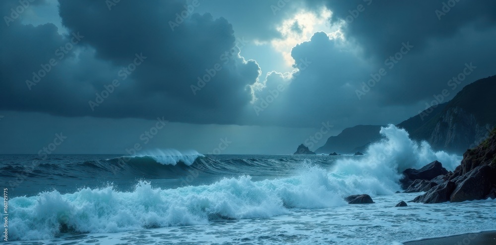 Obraz premium Ocean waves crashing against a rocky shoreline under a dramatic, cloudy sky