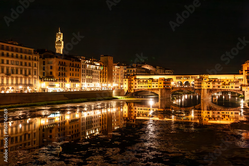 Night falls over Florence, illuminating the Ponte Vecchio and surrounding buildings. The tranquil Arno River reflects the vibrant lights, creating a magical atmosphere in Tuscany.
