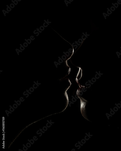 two girls kissing dark low key