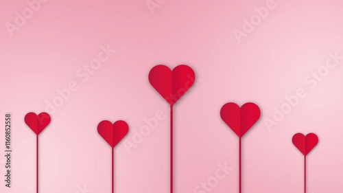 Minimalistic red heart shapes animation on thin stems set against a soft pink background, symbolizing love and affection, perfect for Valentine's Day or romantic designs.