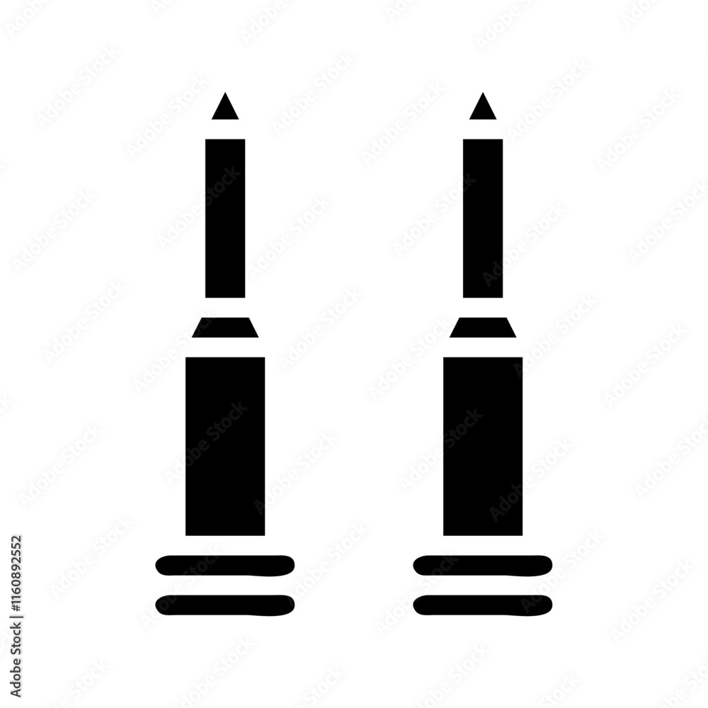 Two black eyeliner pencils isolated on white background. Concept of beauty and makeup. Two black eyeliner pencils isolated on white background. Concept of beauty and makeup.