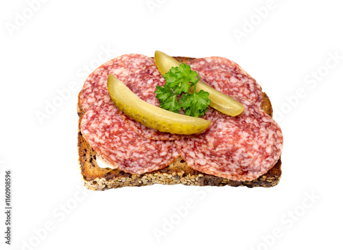 Wholemeal bread slice with salami and pickled cucumbers on transparent background