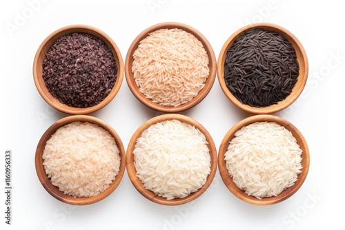 Different types and colors of rice riceberry brown and white Thai jasmine rice in a wooden bowl isolated on a white background Healthy food Flat lay Top view photo