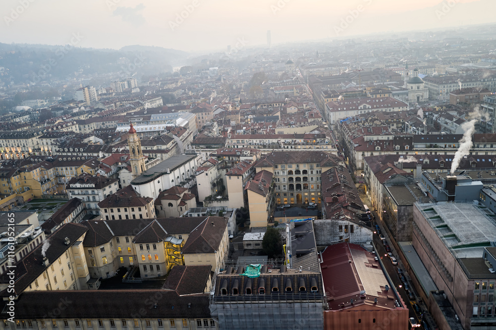 Fototapeta premium Views of the city of Turin at sunset from the dome of the Mole Antonelliana