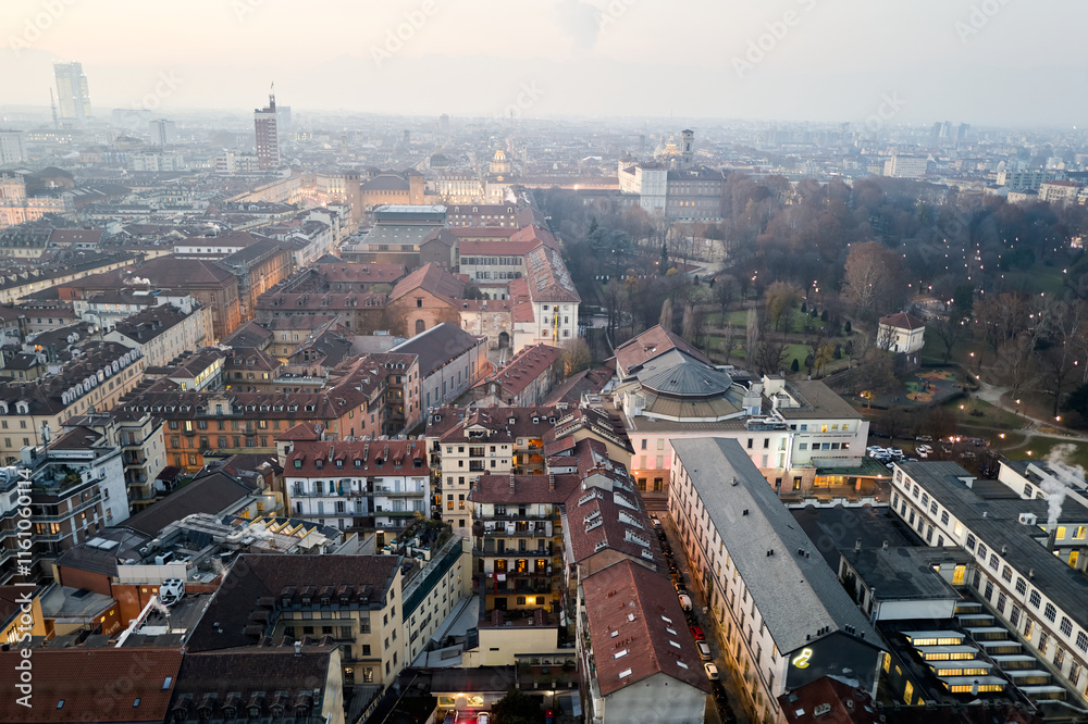 Fototapeta premium Views of the city of Turin at sunset from the dome of the Mole Antonelliana